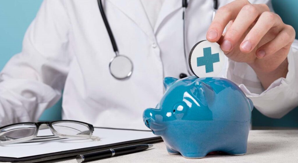 Doctor saving money in piggy bank symbolizing affordable cancer surgery and treatment costs